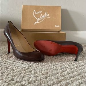 Christian Louboutin red bottom pumps 7.5